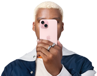 Person holding iPhone 15 in front of his face to conceal indentity