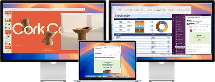Open MacBook Air with two external displays, showing a variety of apps onscreen