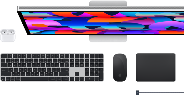 Mac accessories: AirPods, Studio Display, Magic Keyboard, Magic Mouse, Magic Trackpad, MagSafe charge cable in Midnight color