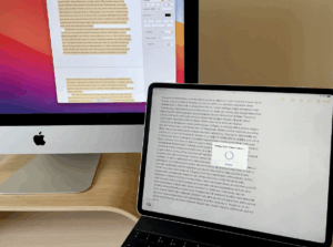 iMac and iPad using Apple Continuity Universal Clipboard to copy and paste text seamlessly between devices.